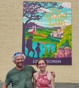 Bernie and Maggie Poff in front of the Lift Lodi mural.